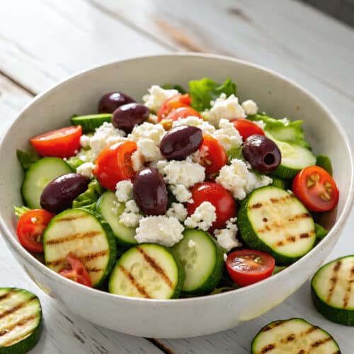 Grilled zucchini Greek salad in a bowl with feta and tomatoes1